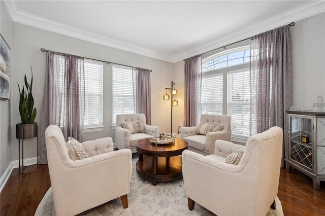 living room with wood-type flooring and crown molding