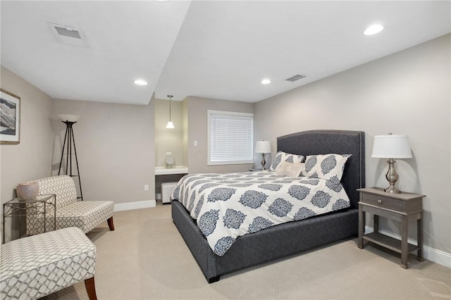 bedroom featuring light colored carpet