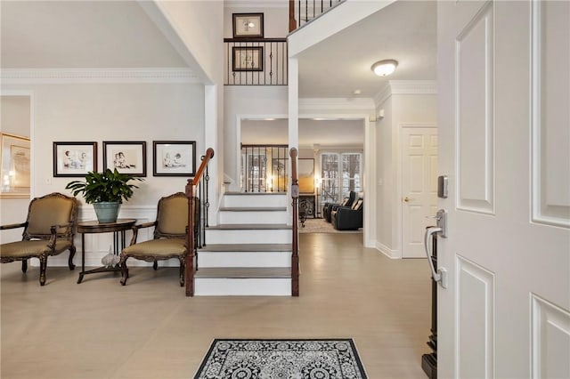 entryway featuring ornamental molding