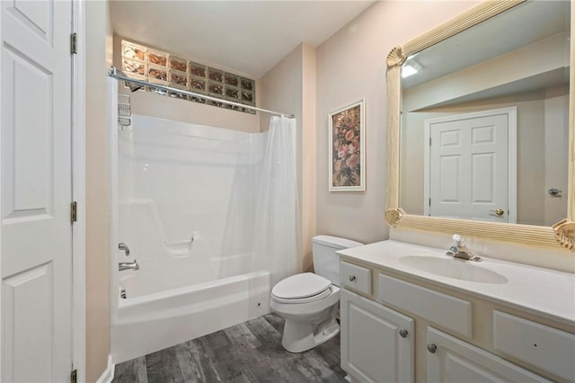 full bathroom with toilet, vanity, shower / bath combo, and hardwood / wood-style floors