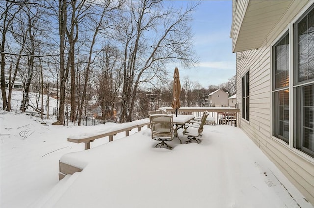 view of snow covered deck