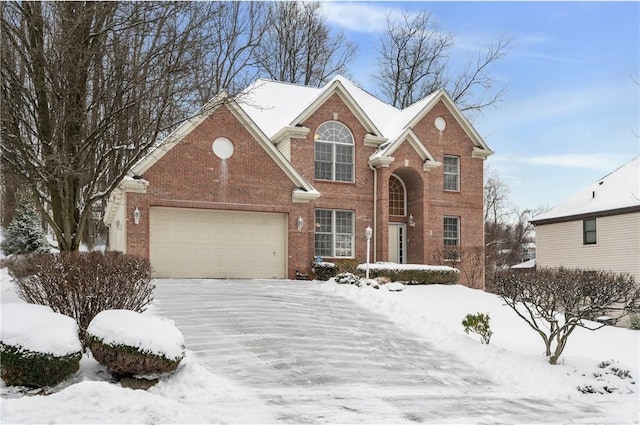 front facade with a garage