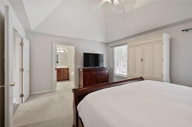 bedroom featuring ceiling fan, light carpet, connected bathroom, and high vaulted ceiling