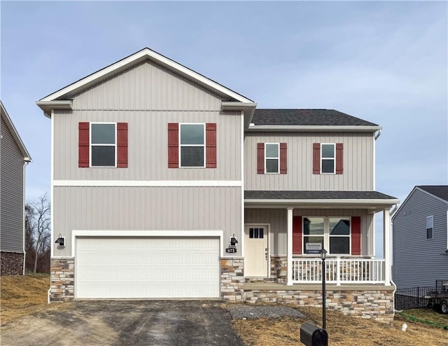 craftsman house featuring a shingled roof, stone siding, aphalt driveway, an attached garage, and a porch