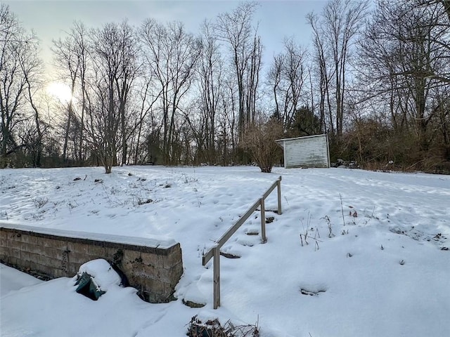 view of yard covered in snow