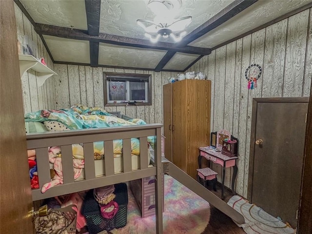 bedroom with beamed ceiling