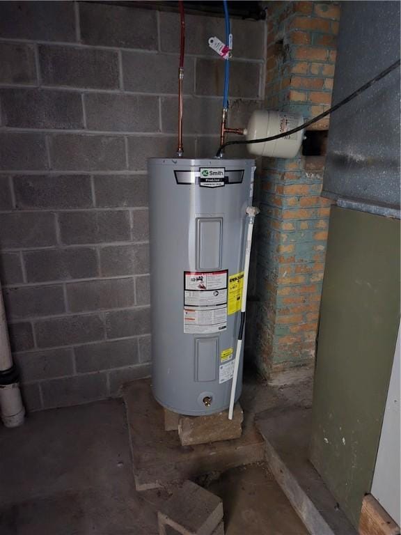 utility room with water heater