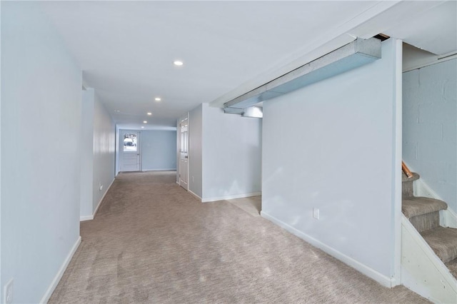 basement with light carpet