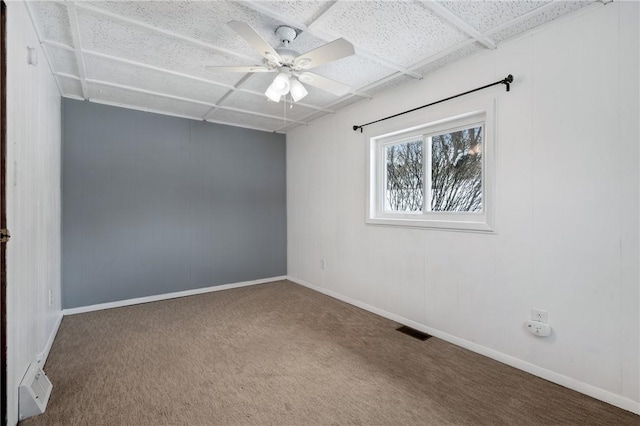 unfurnished room with ceiling fan and carpet flooring