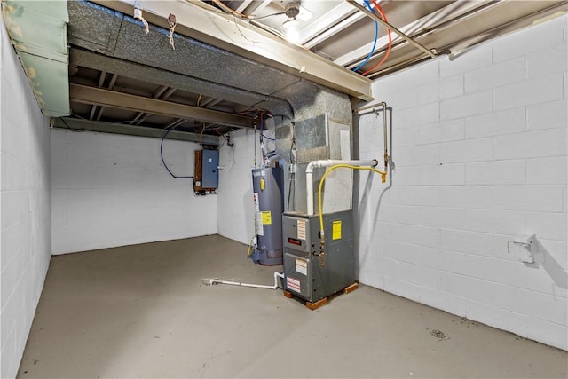 basement featuring heating unit, water heater, and electric panel