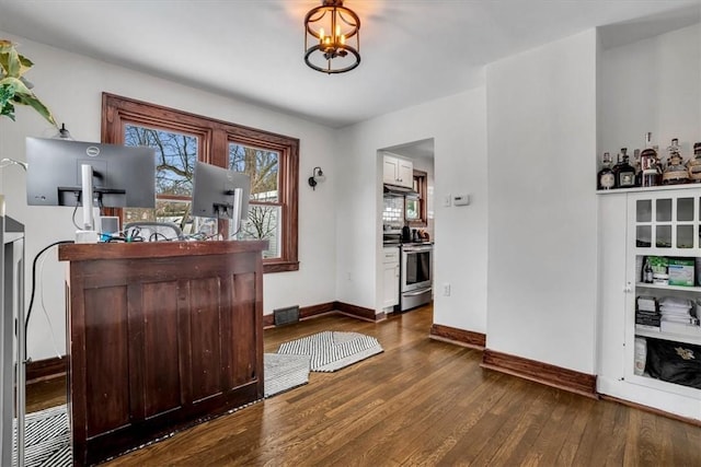 office space featuring dark hardwood / wood-style floors