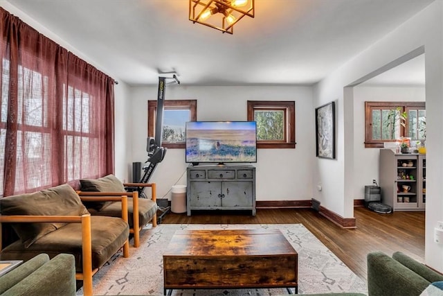 living room with dark wood-type flooring