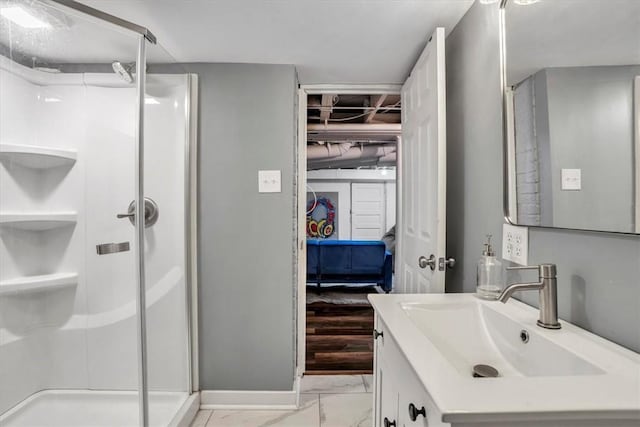 bathroom with vanity and walk in shower