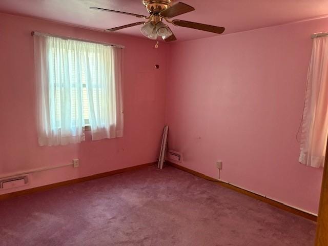 empty room with light carpet and ceiling fan