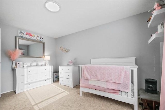 bedroom with light colored carpet