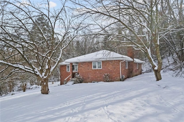 view of snow covered property