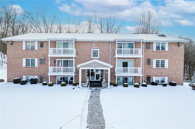 view of snow covered property