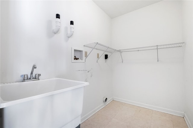 laundry area featuring sink and washer hookup