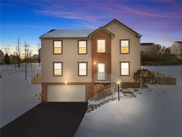 view of front of home with a garage