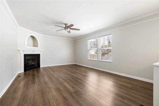 unfurnished living room with ornamental molding, dark hardwood / wood-style floors, and ceiling fan