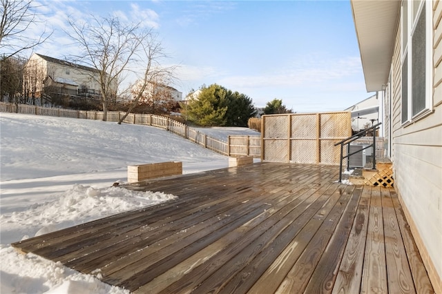 view of snow covered deck