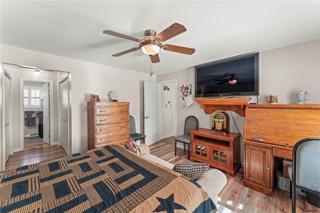 bedroom featuring hardwood / wood-style floors and ceiling fan