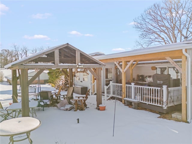 view of snow covered patio