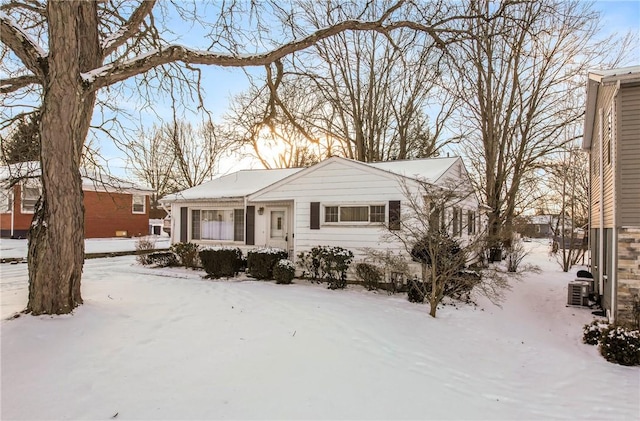 ranch-style house with central air condition unit