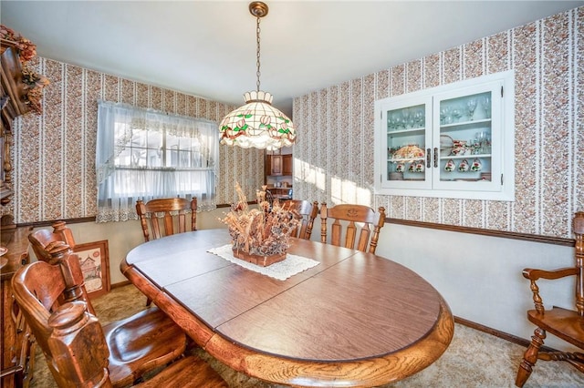 view of carpeted dining room