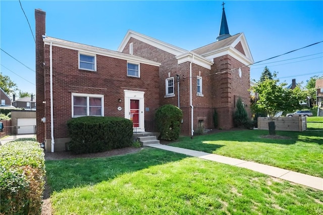 view of front facade featuring a front yard