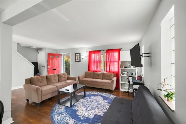 living room with dark wood-type flooring