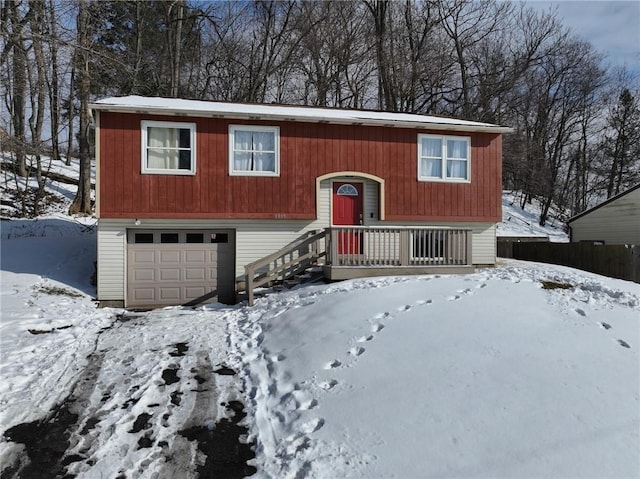 bi-level home featuring a garage