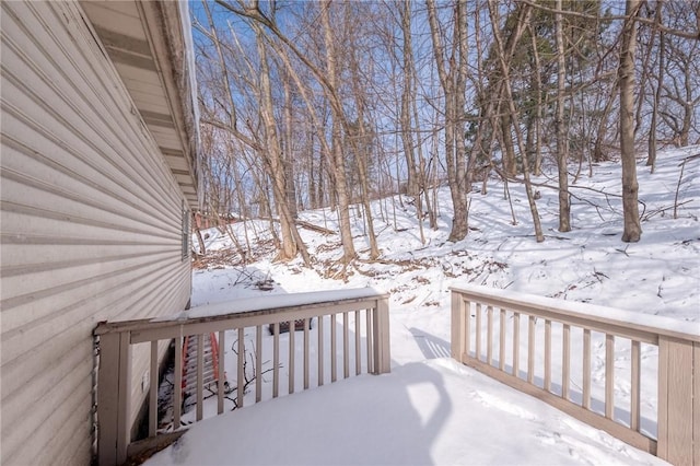 view of snow covered deck