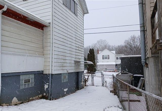 view of snow covered property