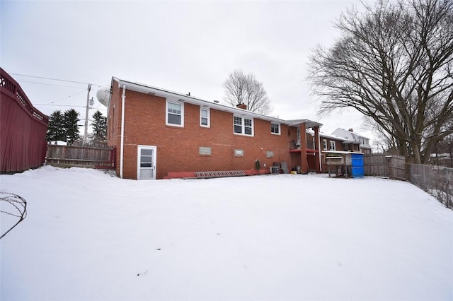 view of snow covered property