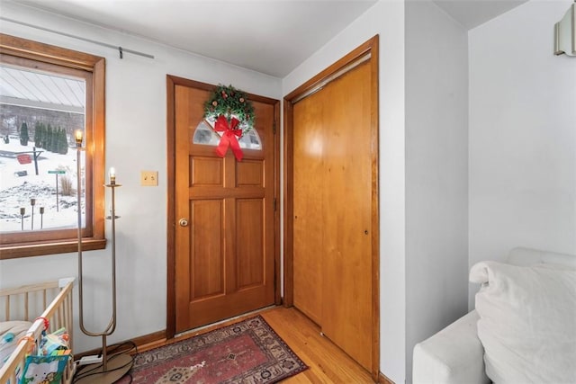 entryway with a healthy amount of sunlight and light wood-type flooring