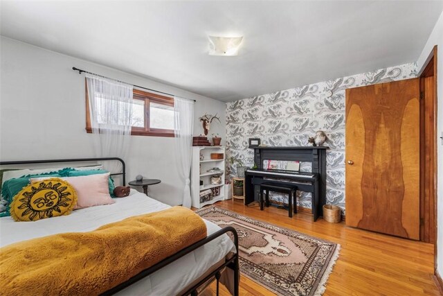 bedroom featuring wood-type flooring