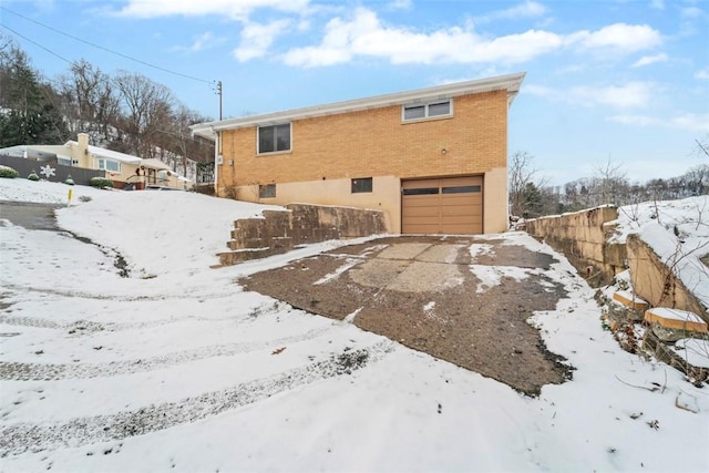 exterior space with a garage