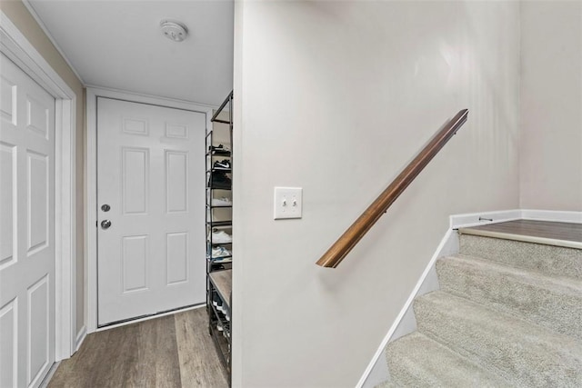 foyer entrance with hardwood / wood-style floors