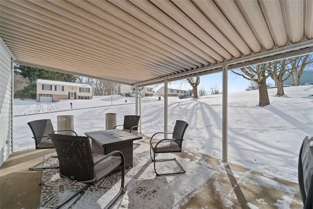 view of snow covered patio