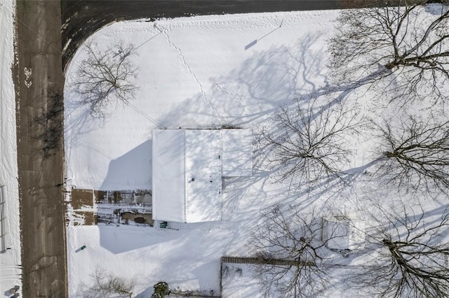 view of snow covered property