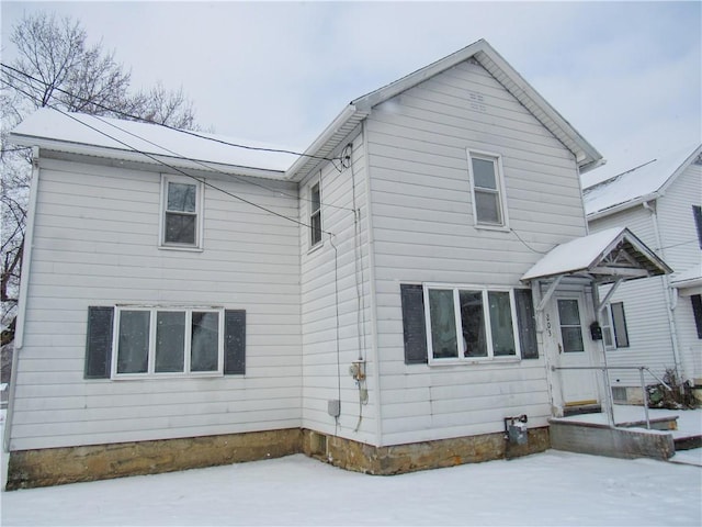 view of snow covered property