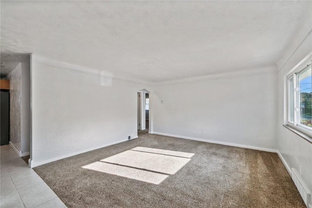 empty room featuring carpet flooring