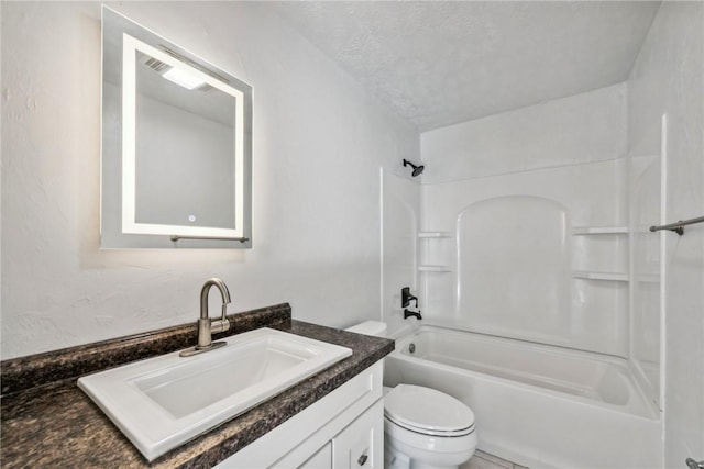 full bathroom with shower / bathtub combination, a textured ceiling, toilet, and vanity