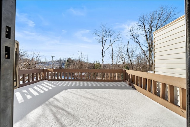 view of snow covered deck