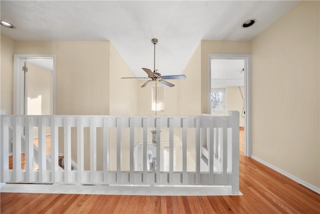 stairs with radiator and hardwood / wood-style floors