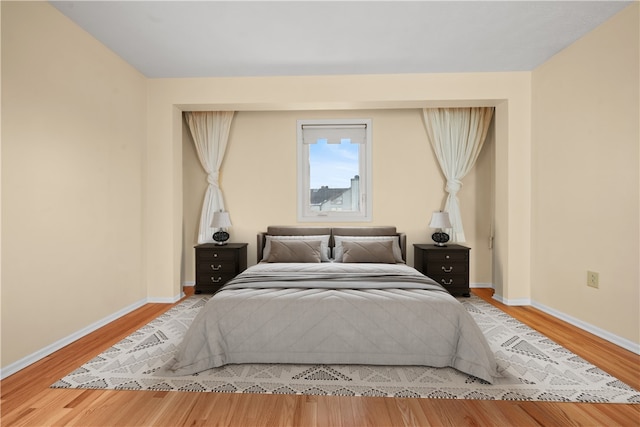 bedroom with light hardwood / wood-style floors