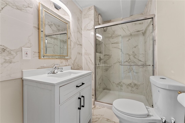 bathroom featuring toilet, an enclosed shower, and vanity