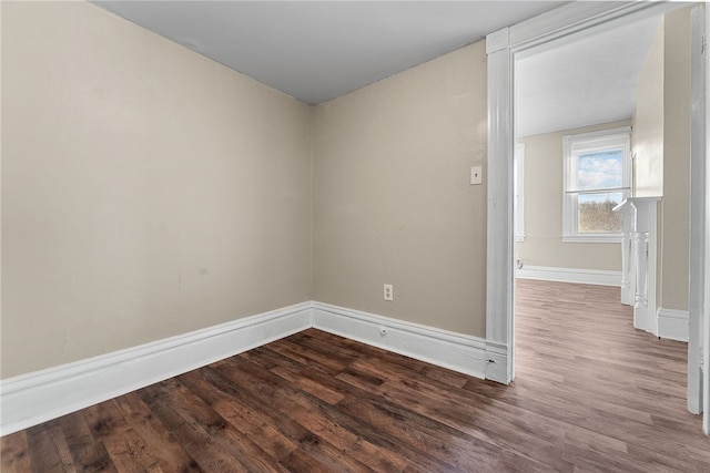 spare room featuring hardwood / wood-style floors