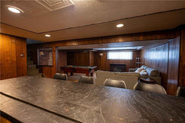 cinema featuring pool table and wooden walls